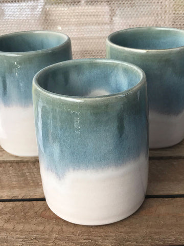 https://fireandmudstudios.com/cdn/shop/products/Bmix-tumblers-with-mystery-gray-float-over-grannies_large.jpg?v=1598391671